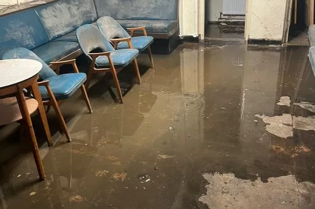 Landslide wrecks village social club