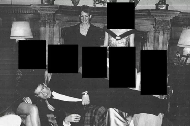 Andrew Mountbatten-Windsor Epstein files photo shows former prince lying on five people's laps