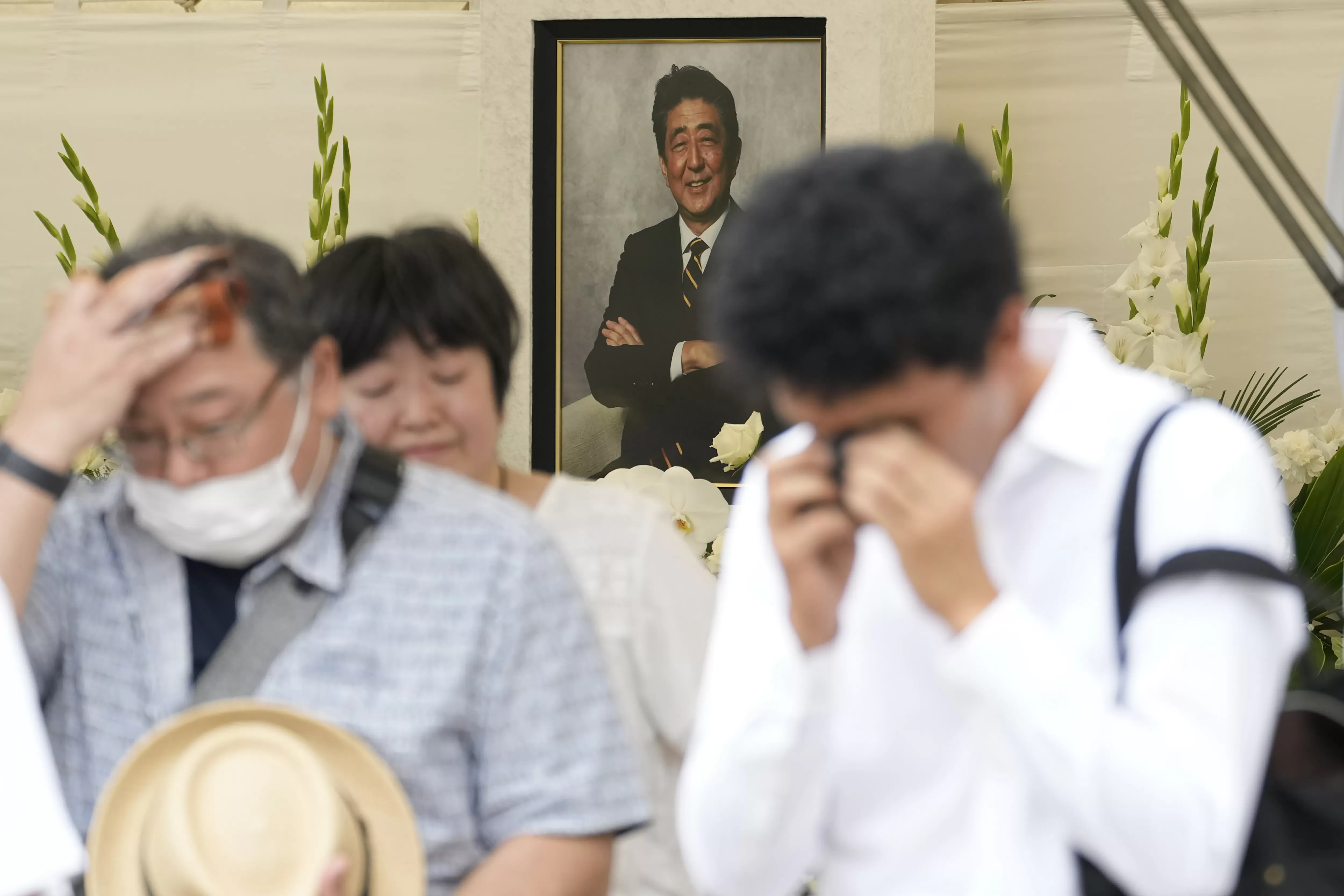 Man who killed former Japanese prime minister sentenced to life in prison