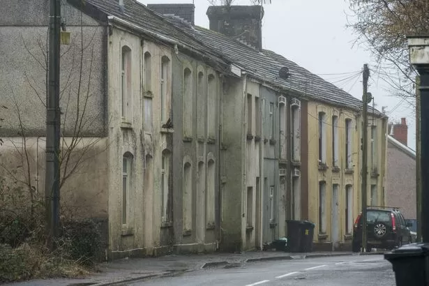 Ghost street where houses lie abandoned after owners were ordered to flee disaster that never came