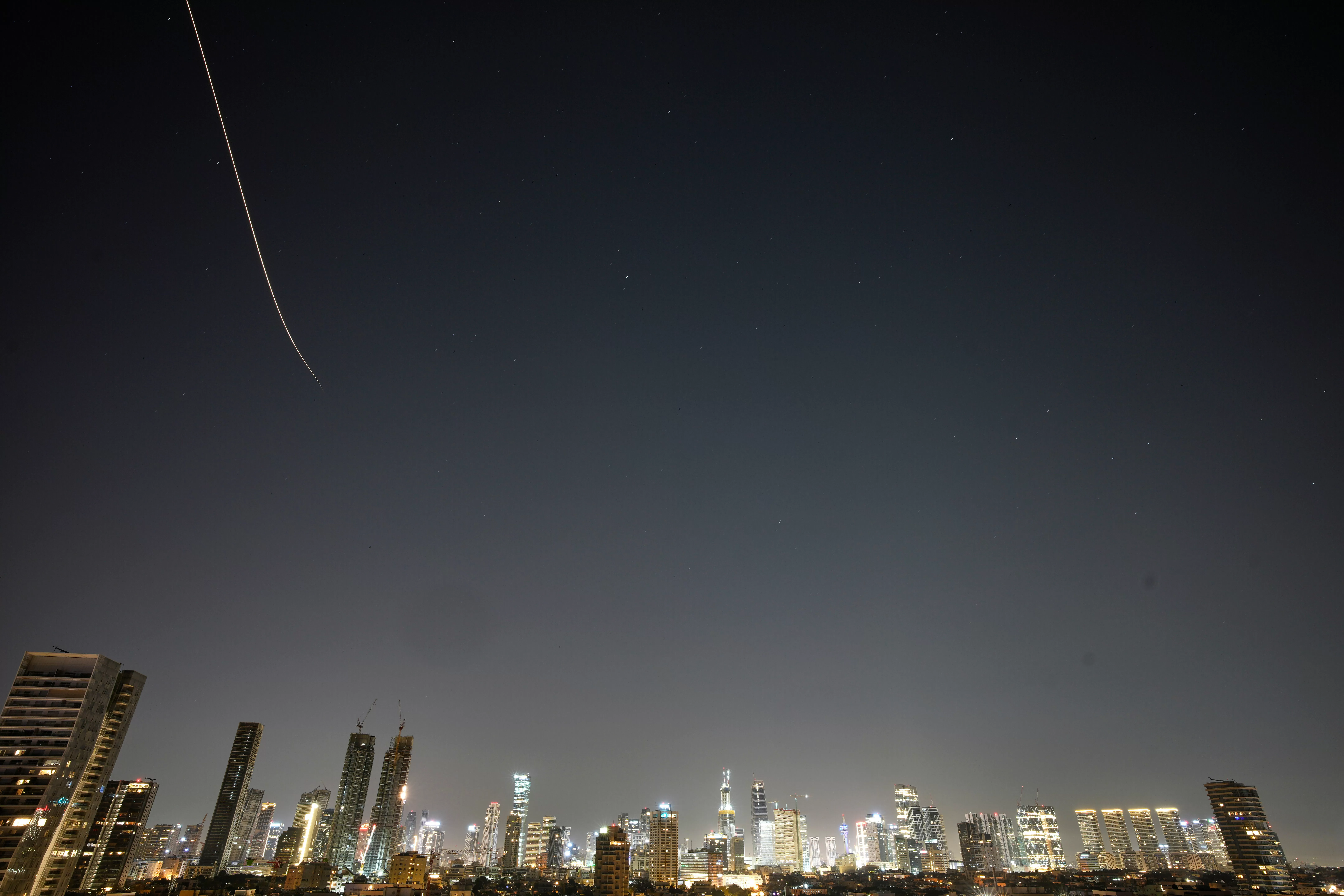 Iran and Israel trade strikes amid mixed signals over talks to end war