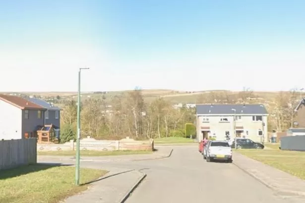 Man found dead in car as three arrested in 'murder' probe