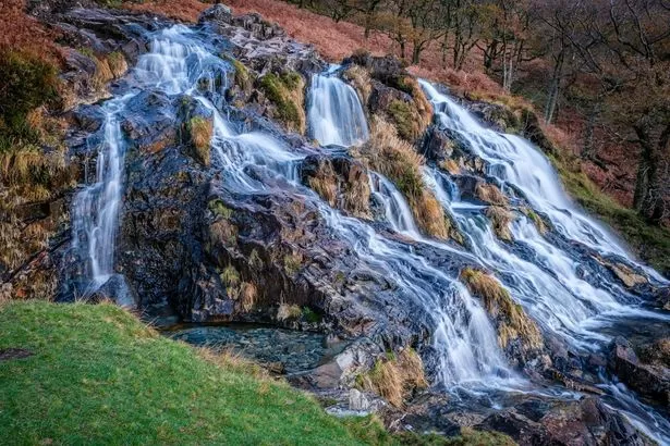 Sisters paddled fully clothed before their tragic deaths at Welsh beauty spot