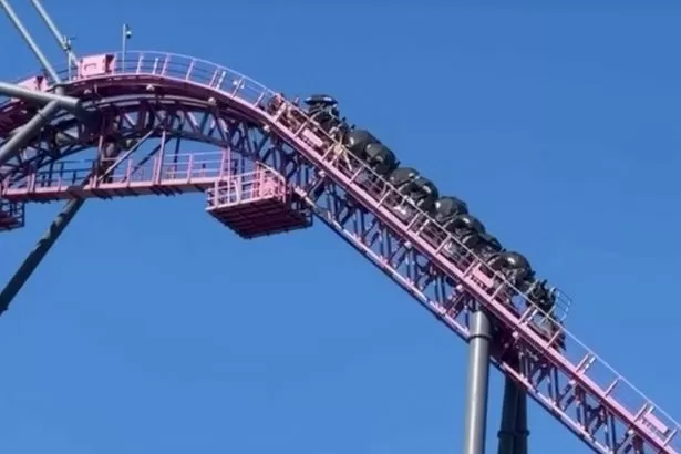 Warner Bros theme park horror as 20 tourists left hanging 33ft in 30C heat
